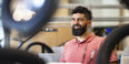 Image of Iyad Obeid sitting in an engineering lab.