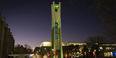 Bell Tower lit green pictured.