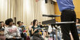 Image of the concert choir rehearsing.
