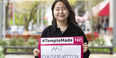 Image of Sera Park holding a sign reading #TempleMade for art conservation.