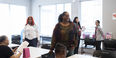 Image of a community health worker at Temple’s breast cancer awareness event.    
