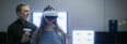 W. Geoffrey Wright with a research assistant wearing the UprightVR headset in the Motion-Action-Perception Laboratory 