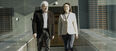 Steve Balsam ad Connie Mao walking in the Skybridge.