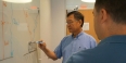 Hai-Lung Dai at a whiteboard