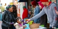 A girl accepting candy.