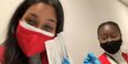 Moraine Kisenda and Isha Dev with COVID vaccine syringes.