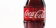 A plastic bottle featuring the iconic red and white Coca-Cola logo.