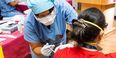 front-line worker receiving a vaccine injection 