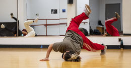 Image of a Temple dance student breaking.