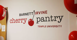 A sign reading Barnett Irvine Cherry Pantry 