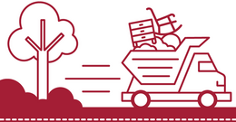 Image of a truck carrying furniture and trash driving past a tree