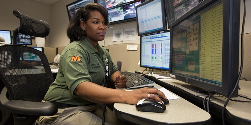 Phylicia Rosario working at a computer. 