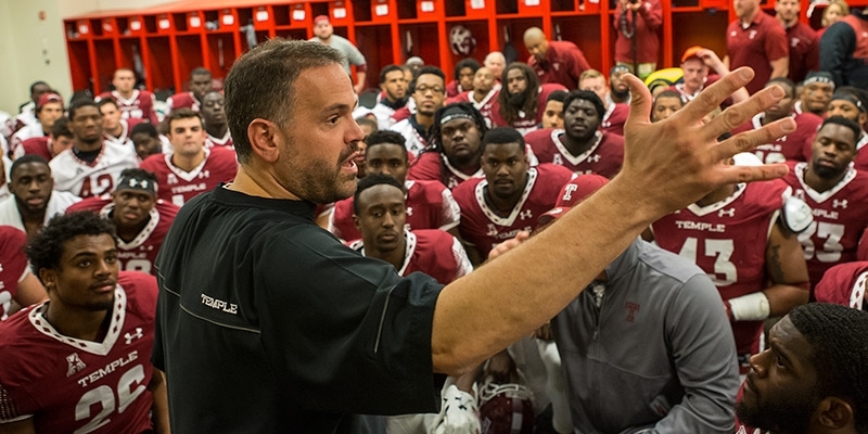 Coach Rhule in the locker room after football’s tenth win over UConn.