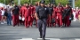 a Temple University police officer escorting football players as they walk into Lincoln Financial Field.