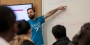 Assistant Professor Daniele Ramella pointing to a whiteboard while teaching.