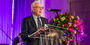 Larry Magid speaking at a podium