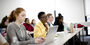 Students using computers in a classroom 