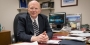 Assistant Vice President and Bursar David Glezerman sitting at his desk