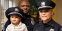 Sergeants Kamari and Lauren Boone with their toddler son