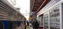 People boarding SEPTA Regional Rail at the Temple University station