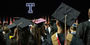 Image of graduates looking towards the stage at Temple’s 135th Commencement.