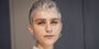 Image of Courtney Kater in a sweater.
