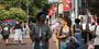 Students walking on campus during the first day of classes.