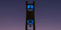 The Bell Tower at night lit up in teal