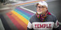 Scott Gratson standing at the rainbow crosswalks on 13th and Locust in Philadelphia