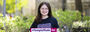 Chloe Kranz holding a #TempleMade sign