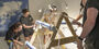 Image of students installing a hydroponic system.