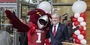 President Fry poses with Hooter the Owl mascot at bookstore grand opening