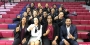 the Temple women’s basketball team holding up their fingers to signify No. 1.