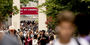 Students on campus near the bell tower.