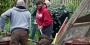 Temple volunteers working in a community garden on Global Day of Service.