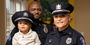 Sgts Kamari and Lauren Boone with their son Kaleb 