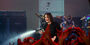 Ozzy Osbourne spraying crowd with a hose 