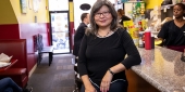 Shirley Moy sitting at a diner counter