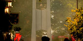 students walking by Temple Bell Tower