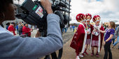 Alison Lorraine reporting at the Independence Bowl