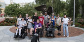 ACES 2023 participants in front of the Owl statue