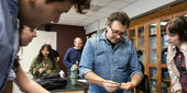 Sam Van Aken working with students