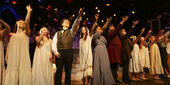 Image of the cast of Goblin Market performing on stage.