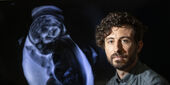Vlad Ayzenberg next to a baby scan