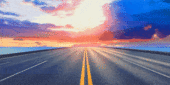 GIF of Barbie driving a pink car down an empty road