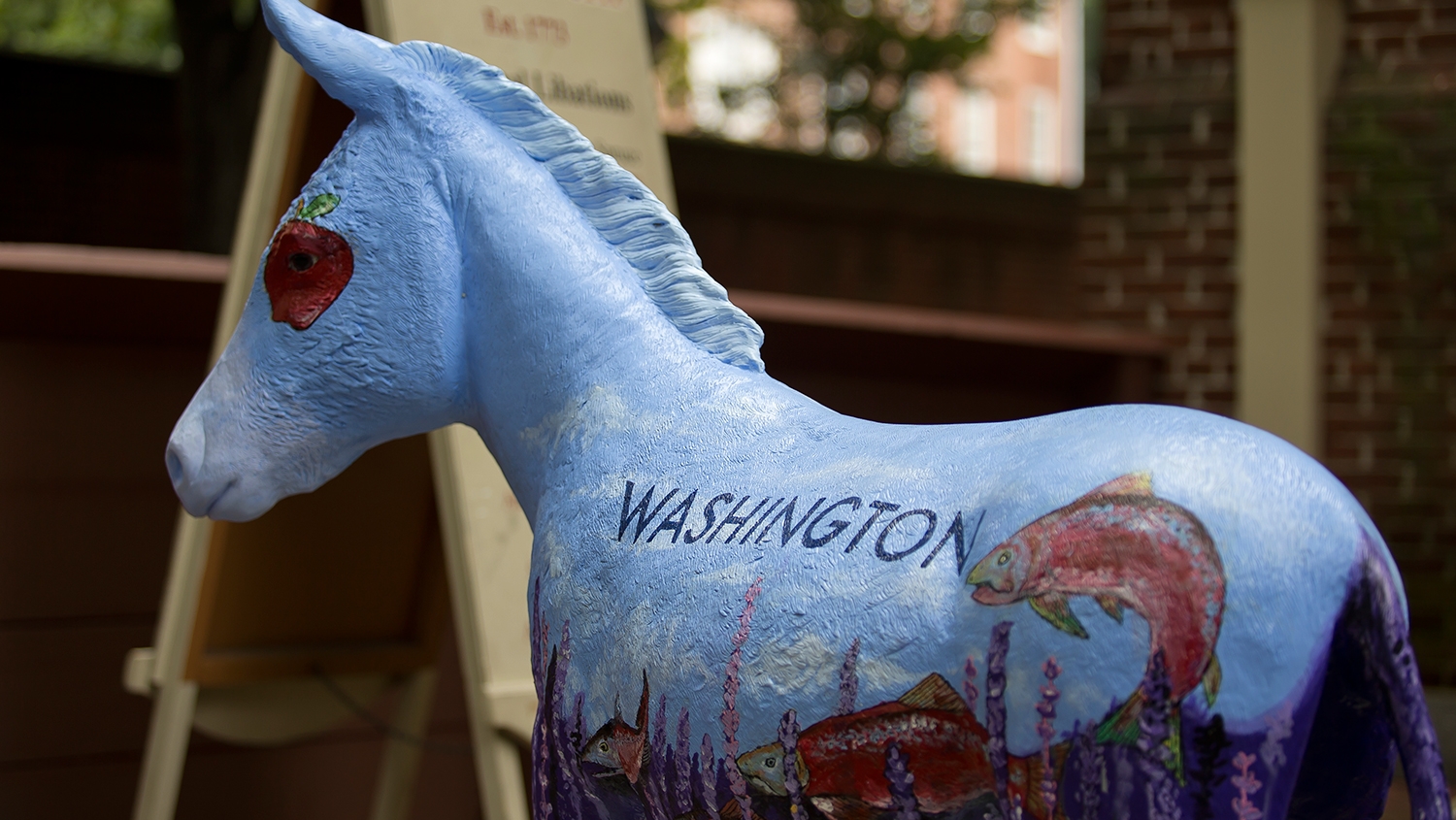 A donkey painted with visual elements representing Washington.