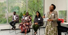 Heather Lewis-Weber and panelists at the opening event