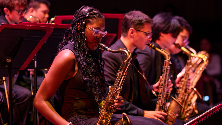 Saxophone players performing in a jazz band